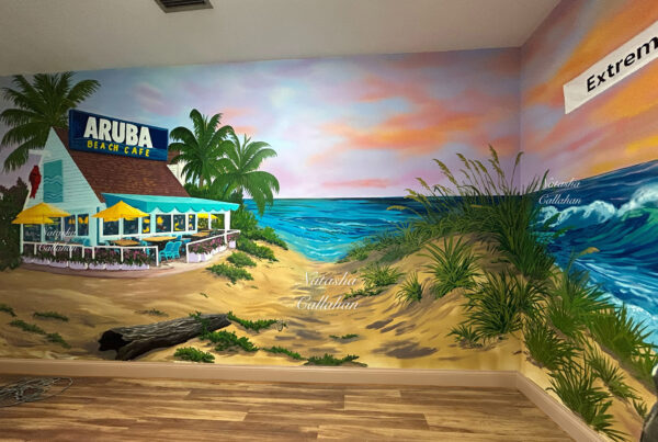 Beach cafe mural with palm trees and ocean waves.